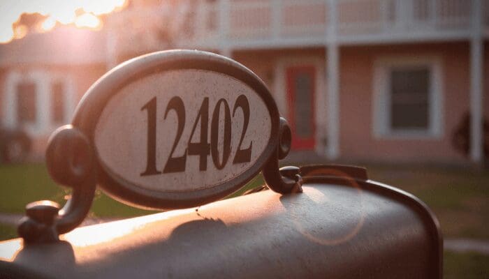 address numbers 12402 on a mailbox