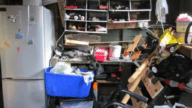 An image that shows a garage full of stuff in house.